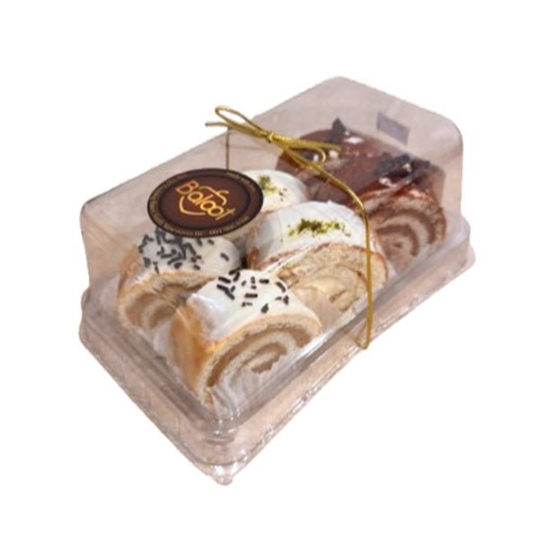 assortment of Baloot Roullet, featuring two chocolate, two vanilla, and two cappuccino rolls.